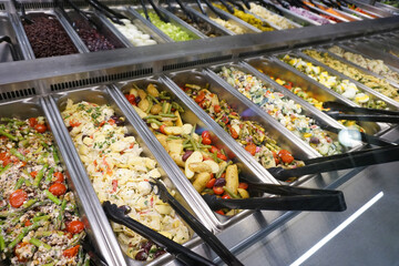 variety of colorful cooked food buffet in restaurant