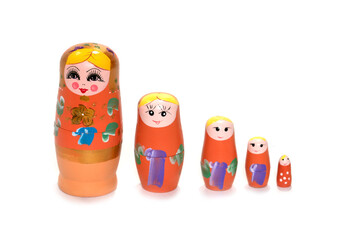 Wall Mural - Colorful colored nesting dolls on a white background. Russian national souvenir