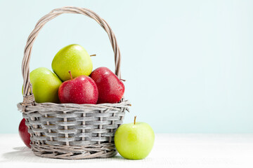 Wall Mural - Colorful ripe apple fruits in basket