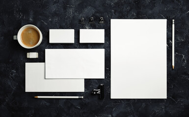 Wall Mural - Blank branding stationery set on black plaster background. Template for placing your design. Branding mock up.