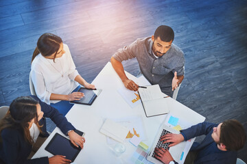 Aufkleber - Presenting our campaign to a client. High angle shot of a group of young businesspeople having a boardroom meeting at work.