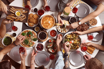 Sticker - Group of people having brunch together at table indoors, top view