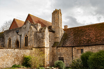 Wall Mural - Old traditional medieval stone English house closeup