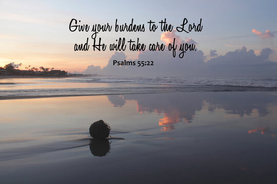 Wall Mural -  - Bible verse inspirational quote - Give your burdens to the Lord and He will take care of you. Psalms 55:22 On tranquil morning light sunrise on the beach. Believe surrender to God concept.