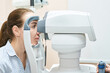 © elenavolf - ophthalmologist medical patient. Eye clinic treatment. Hospital optics equipment. Choosing vision pain eyedrop. conjunctivitis diagnosis doctor. optometry allergy pain