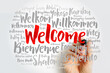 © dizain - WELCOME word cloud with marker in different languages, conceptual background