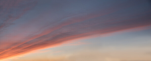 Wall Mural - sunset sky with pink clouds, diagonally stripe