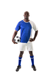 Full length portrait of confident male african american athlete with soccer ball on white background