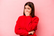 © Asier - Young caucasian woman isolated on pink background scared and afraid.