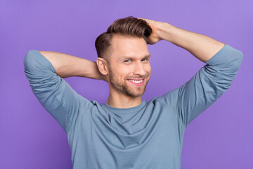 Wall Mural - Photo of cute brown hairdo guy hands hair wear trend cloth isolated on violet color background