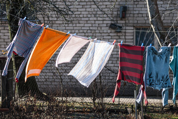 Wall Mural - Clothes dries in the yard of Kuldiga Old Town, Latvia.