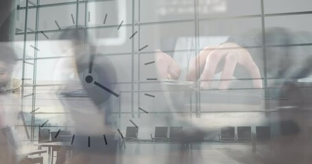 Canvas Print - Animation of hand of caucasian man using computer over clock moving