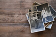 old family photographs, pictures from 1935 in sepia color on wooden table, home archive documents, concept of family tree, genealogy, memories, memory of ancestors, family tree, nostalgia