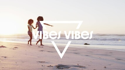 Sticker - Animation of vibes vibes text over african american mother and daughter walking at beach