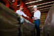 © NVB Stocker - Caucasian business man and Factory engineer talking and discussion at Heavy Industry Manufacturing Factory. worker in safety hardhat at factory industrial facilities