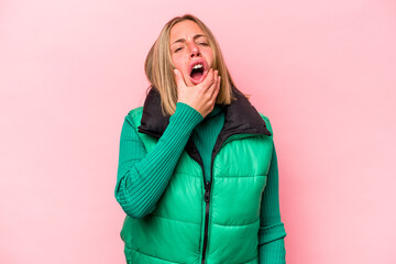 Wall Mural - Young caucasian woman isolated on pink background having a strong teeth pain, molar ache.