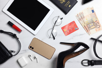 Poster - Flat lay composition with passport, money and accessories on white marble background. Packing for business trip