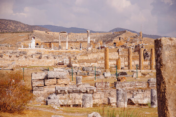 Ancient ruins of Amphitheater in Hierapolis city in Pamukkale Turkey sunset