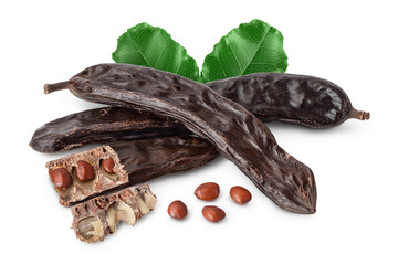 Ripe carob pods and bean isolated on white background with clipping path and full depth of field