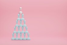 Pyramid Of Pastel Blue Pawns With A Silver Pawn In The Top.3D Conceptual Illustration