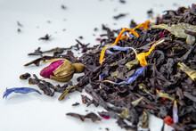 A Blend Of Ceylon Black And Green Sencha, Loose Leaf Tea With Dried Fruit Pieces, Flower Rose Buds And Petals, Apple, Cornflower, Calendula, Top View