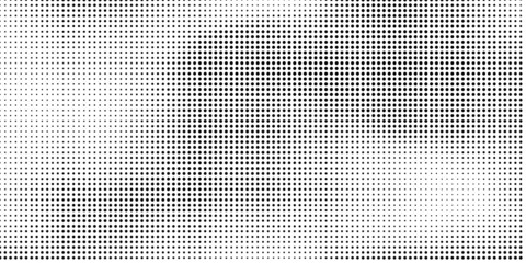 Wall Mural - Halftone dotted background. Black dots in modern style on a white background.