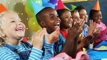 Canvas Print - Animation of shapes over diverse children with party hats at birthday party