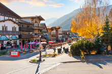 Autumn Afternoon At The Bavarian Themed Village Of Leavenworth, Washington, In The Inland Northwest Of The United States, With Themed Sidewalk Cafes And Shops Along The Pedestrian Only Main Street.	
