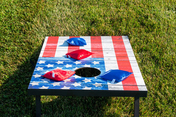 Red white and blue American Flag cornhole game