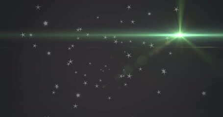 Wall Mural - Animation of glowing green light moving over stars in background