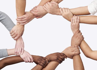 Poster - Linked together in life. Cropped shot of a diverse group of hands joined together.