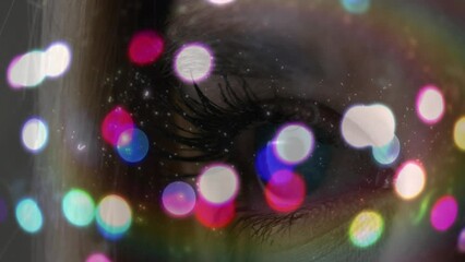 Wall Mural - Animation of light spots over eye of woman