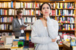 © JackF - Portrait of pensive attractive girl in interior of bookstore