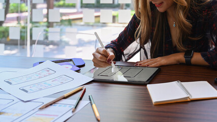 Wall Mural - creative woman sketch planning application process development prototype wireframe for web mobile ph