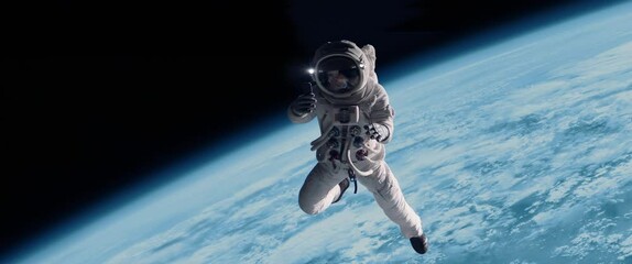 female astronaut having a video call on her phone while performing space walk in open space, earth i