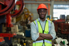 Portrait Engineering Black Male African American Workers Wear Red Helmet Arm Crossed Pose Standing At Machine Area In Factory, Engineering Industrial Concept.