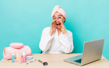 Wall Mural - senior gray hair woman feeling happy,giving a big shout out with hands next to mouth.  skin care and shower concept