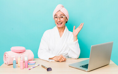 Wall Mural - senior gray hair woman feeling happy, surprised realizing a solution or idea.  skin care and shower concept