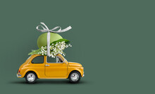 Retro Car Carrying An Easter Egg Atop With Lilies Of The Valley Bunch. Happy Easter Background