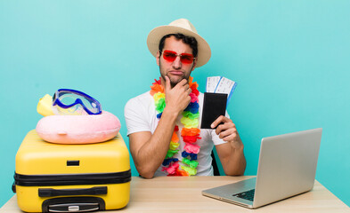 Poster - hispanic handsome man thinking, feeling doubtful and confused. travel and tourism concept