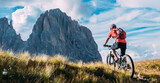 Fototapeta  - Mountain biking in the Dolomites Italy. Mountain bike, electric bike in the mountains on the trail and bike paths