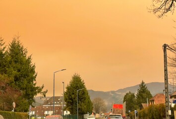 THANN, FRANCE - MARCH 15, 2022: Sahara sandstorm and yellow/orange sky