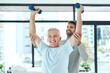 © Camerene P/peopleimages.com - Physiotherapy works. Shot of a friendly physiotherapist helping his senior patient work out with weights.