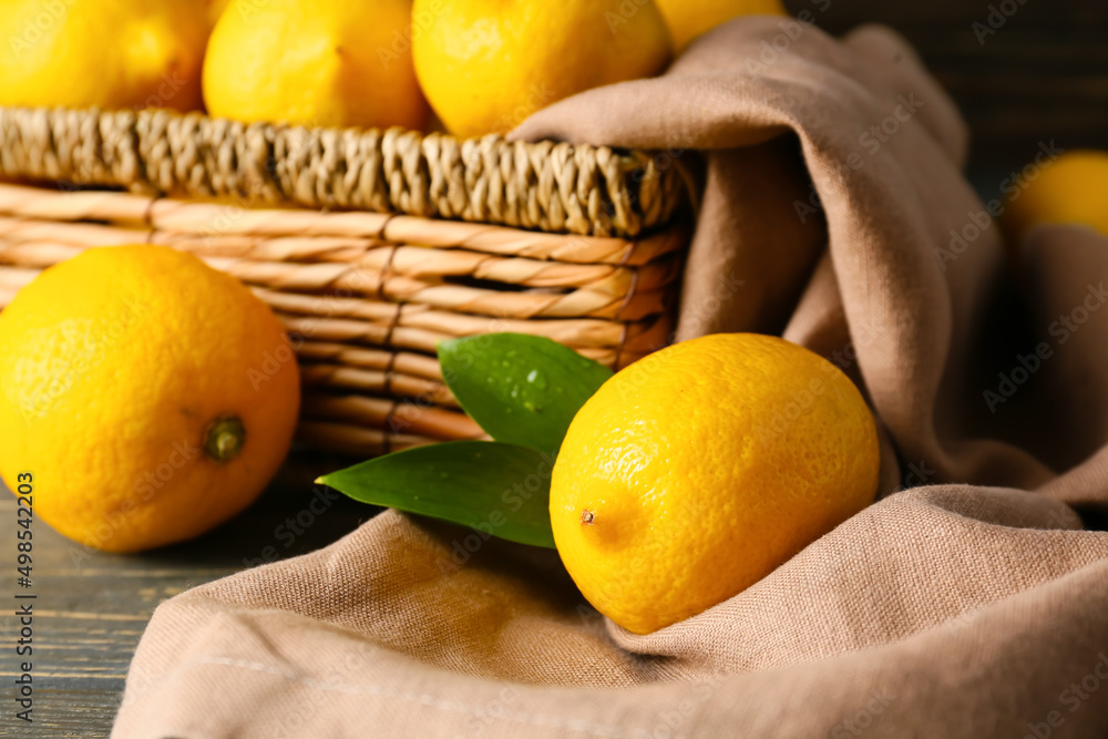 Ripe fresh lemons on table
