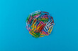 Circle of colored paper clips.