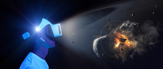 Wall Mural - man uses virtual reality headset to see the far corners of space. elements of this image furnished b