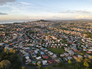 Wall Mural - Aerial view of San Fernando city against the dusk sky at sunset in Trinidad and Tobago