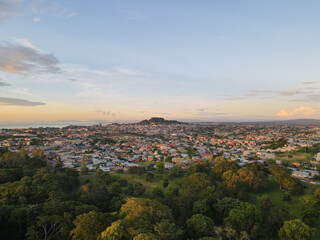 Wall Mural - Aerial view of the cityscape of San Fernando against the dusk sky at sunset in Trinidad and Tobago