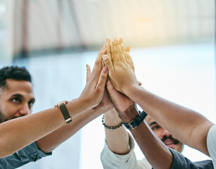 Wall Mural - we did it guys. shot of a group of coworkers high fiving each other.