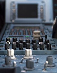 Wall Mural - Closeup shot of radio buttons inside the Airbus 320 cockpit plane